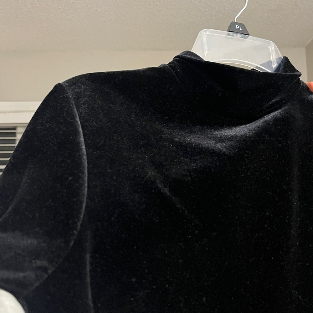 Baxter Well’s Black Velvet Turtleneck